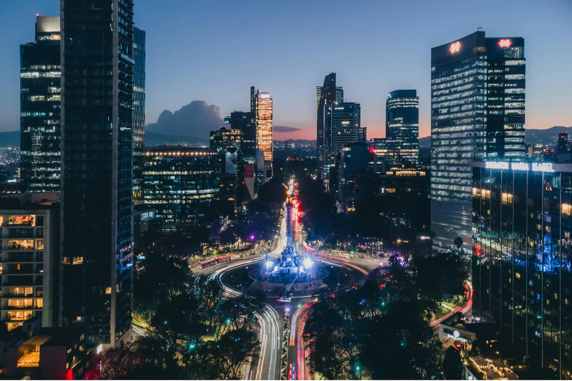 Aerial view of a Latin American city at dusk
